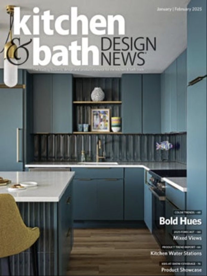 Modern kitchen with blue cabinets, white countertops, gold accents, and open shelves, showcasing luxury interior design. Featured on the cover of Kitchen & Bath Design News, January/February 2025. Designed by a top interior designer in Massachusetts.