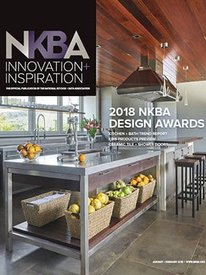 Modern kitchen with stainless steel appliances, wooden ceiling, and a central island brimming with fruit and vegetables. Text highlights 2018 NKBA Design Awards and showcases Luxury Interior Design by an acclaimed Interior Designer Massachusetts.